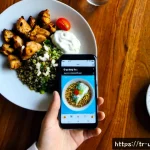 Home 23 식사 기록과 맞춤형 영양 분석 - Photorealistic overhead scene of a Turkish young professional recording a healthy lunch in a smartph...
